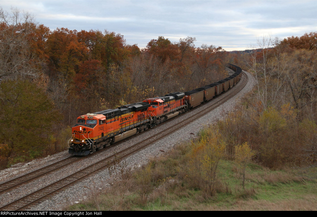 A pair of pumpkins lead coal loads for Detroit Edison past some of the last fall foliage